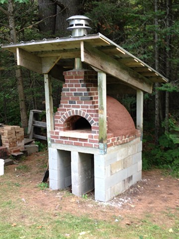 Inexpensive backyard cob oven