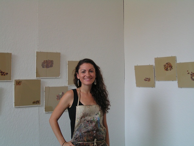 In front of some nest drawings during studio stroll