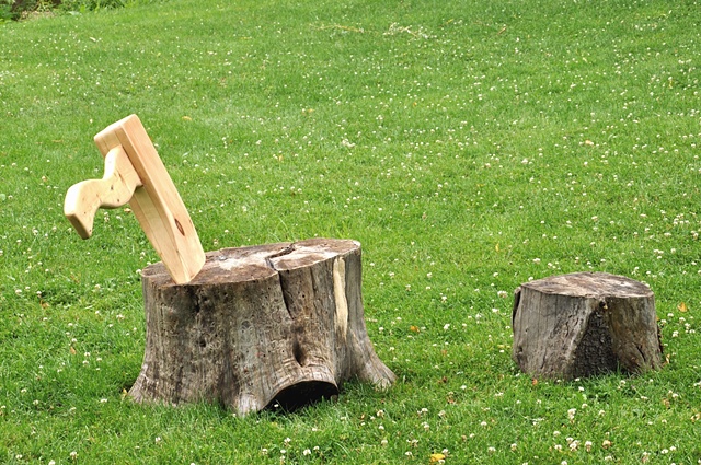 Two stumps and an axe lounge chair