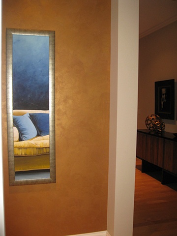 Burnished gold plaster wall.