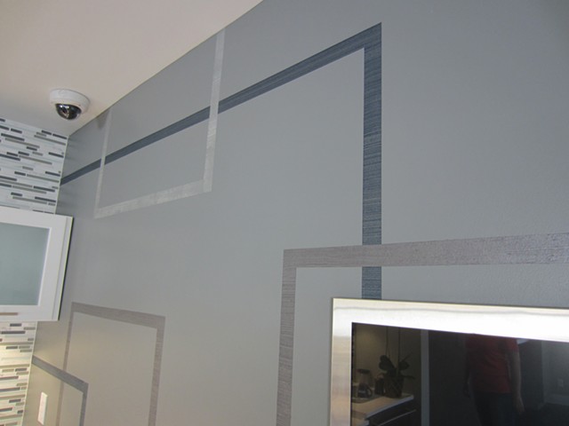 Detail of motif painted for
Integration Controls. Lines are made in raised metallic plaster.
