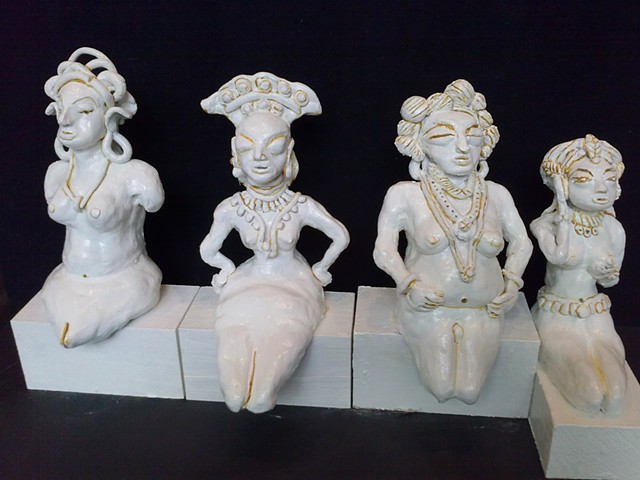 Before Kali. seated figurines
numbers  23,12 , 13, 16