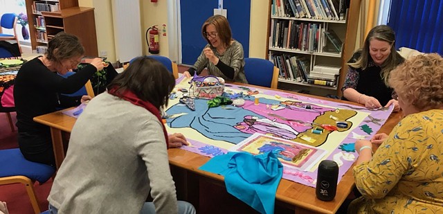 Trilogy of banners: 100 Years of Irish Women