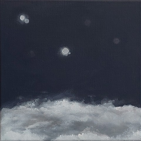 Orbs Over Clouds