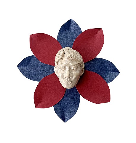 white Flower man blue and red petals, low relief, miniature clay fired sculpture. 