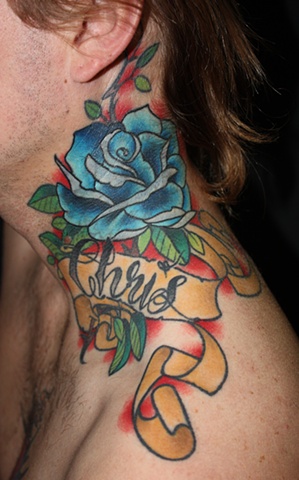 traditional rose neck cover up tattoo by Danny Gordey Ink Machine Edmonton Canada