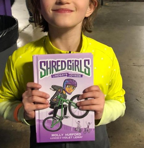 "Shred Girls" in the hands of an avid fan.