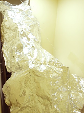 Blanket of Wood and Metal

Contact Paper, Tinfoil, Fishing Line, Eye Screws
