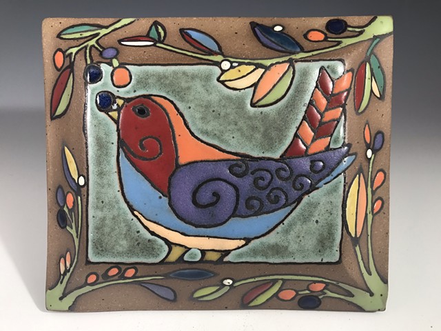 Bird plaque with light blue belly