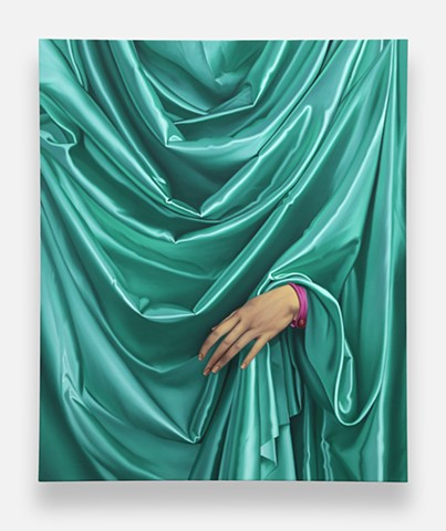 Hand of A Young Man in Green Satin Fabric