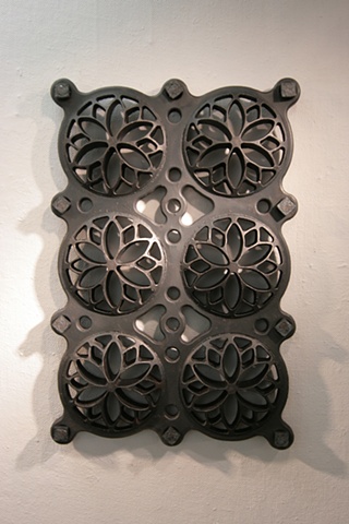 Cast-iron sculpture, while sculpture, repetitive pierced form. By Vaughn Randall