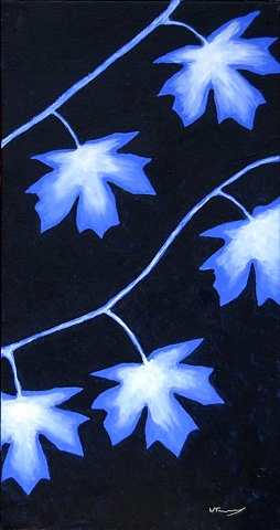 Glowing blue maple leaves in the dark