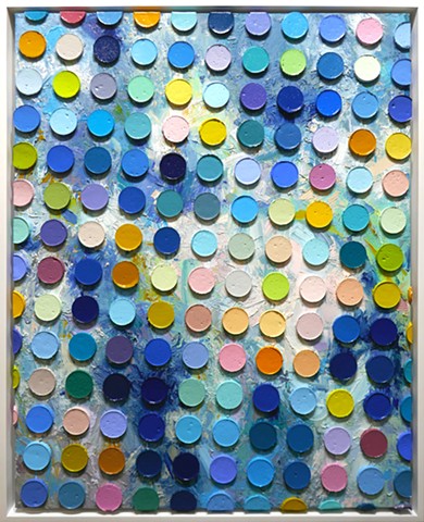 An abstract painting by Daniel Atyim featuring a grid of raised, 3D paint cylinders overlaying a textured background. The multi-colored discs contrast against expressive brushstrokes of blue, yellow orange, white, and violet to create a rhythmic, tactile composition.