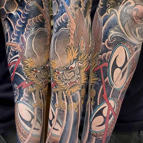 Traditional Japanese forearm featuring Raizen and his drums