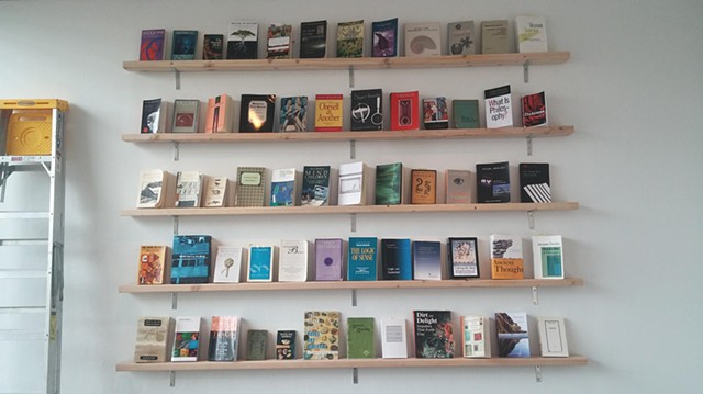 Zone 1 / Book wall [Resonant source material organized via contiguous association]