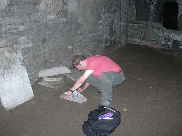Making rubbing of inscriptions at San Crisogono, Rome