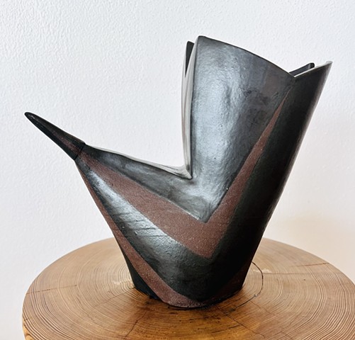 brown & iron V bird detail