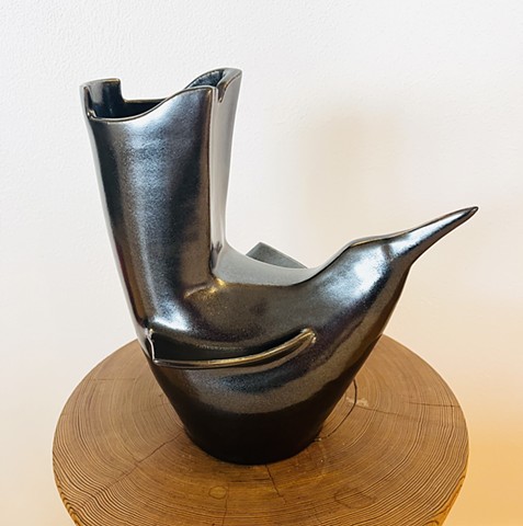 shiny black curvy crow 