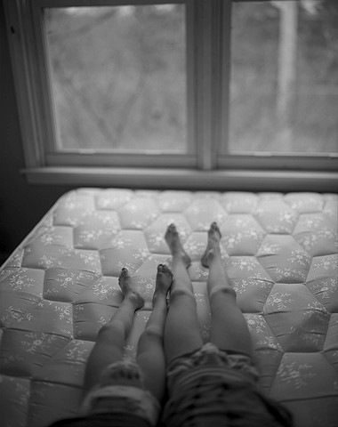 Untitled (Small Legs on Bed)