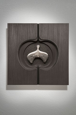 wall sculpture comprised of cast aluminum, wood, graphite, and sewing needle by Mary Meyer