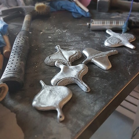 cast aluminum works in progress by Mary Meyer