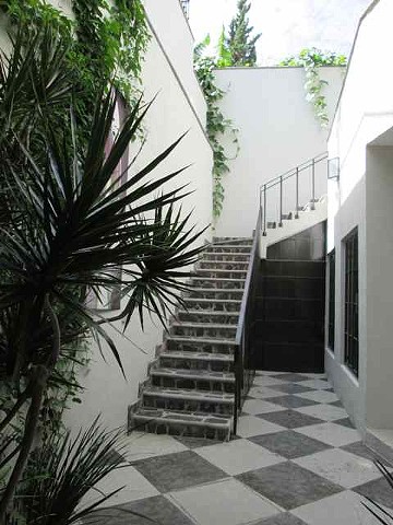 Entrance to stairway on the ground level.