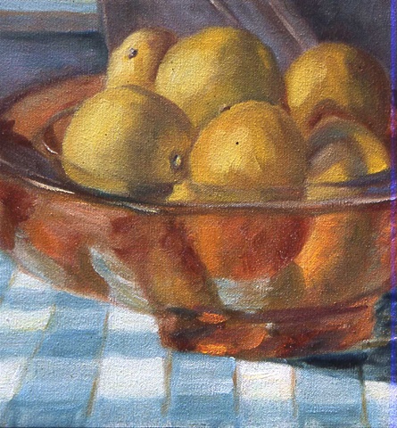 Lemons in orange glass bowl