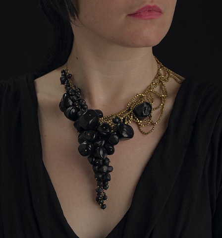 all black beads on this piece are hand made by artist