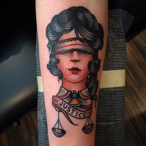 Traditional blind justice tattoo done at classic tattoos by keller