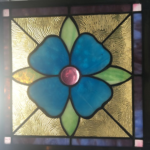 Flower with salvaged glass
