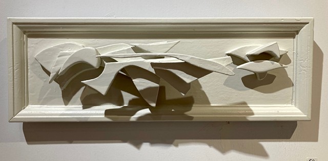 Wall sculpture in white, framed