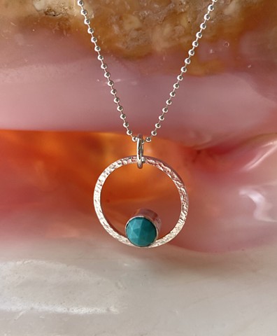 hammered circle with gemstone