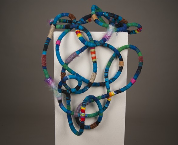 Allie Heckman, Intermediate Fibers, Fall 2016. Coiled yarn around rope core. University of Missouri.