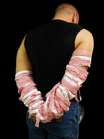 Bound, 2008. Machine-sewn snap tape modeled by Andrew Criss, dimensions variable.