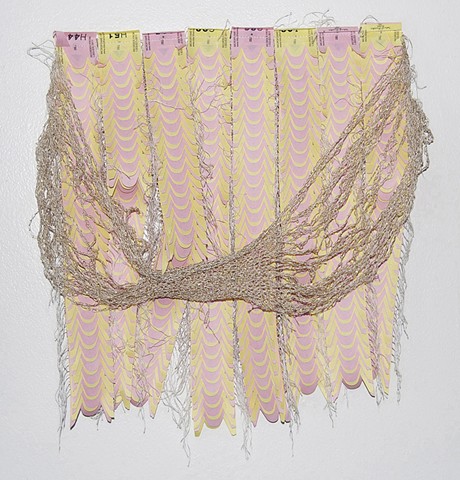 Take-A-Number From Me, 2010. Machine-sewn Take-A-Number tickets and crocheted thread, 15”x14”x1”.