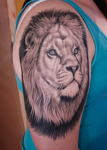 Lion tattoo by dave wah at stay humble tattoo company in baltimore maryland