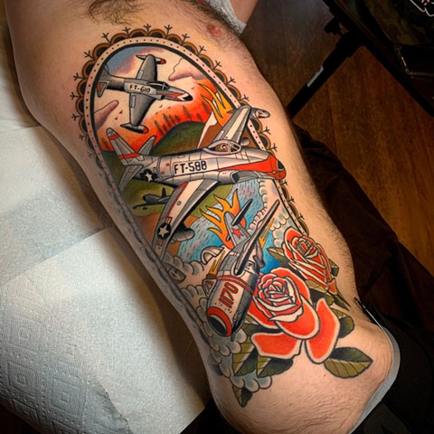 vintage airplane dogfight tattoo by tattoo artist dave wah at stay humble tattoo company in baltimore maryland the best tattoo shop in baltimore maryland