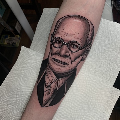 SIGMUND FREUD portrait tattoo by tattoo artist dave wah at stay humble tattoo company in baltimore maryland the best tattoo shop in baltimore maryland