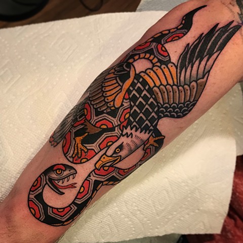eagle and snake tattoo by dave wah at stay humble tattoo company in baltimore maryland the best tattoo shop and artist in baltimore maryland