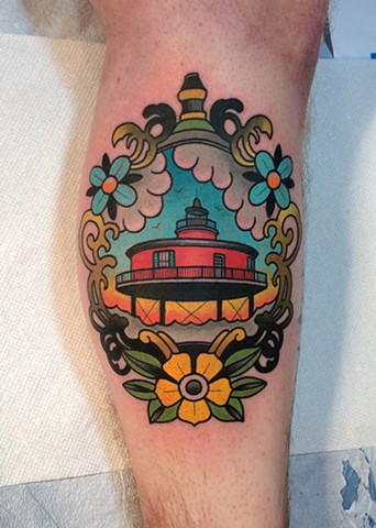 lighthouse tattoo by dave wah at stay humble tattoo company in baltimore maryland the best tattoo shop in baltimore maryland