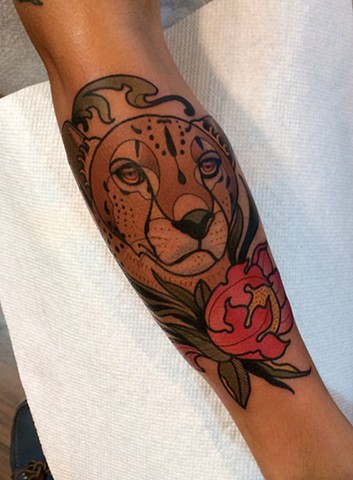cheetah tattoo by dave wah at stay humble tattoo company in baltimore maryland the best tattoo shop in baltimore maryland