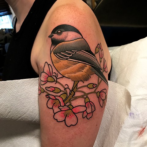 black capped chickadee bird tattoo by dave wah at stay humble tattoo company in baltimore maryland the best tattoo shop and artist in baltimore maryland