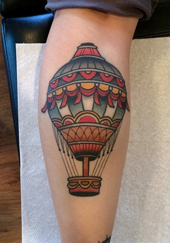 hot air balloon tattoo by dave wah at stay humble tattoo company in baltimore maryland the best tattoo shop in baltimore maryland