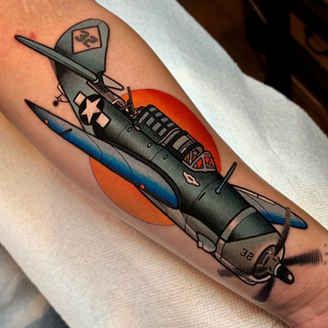 SB2C hell diver plane tattoo by dave wah at stay humble tattoo company in baltimore maryland the best tattoo shop and artist in baltimore maryland