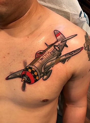 ww2 airplane tattoo by tattoo artist dave wah at stay humble tattoo company in baltimore maryland the best tattoo shop in baltimore maryland