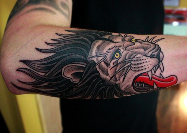 Lion tattoo by dave wah at stay humble tattoo company in baltimore maryland