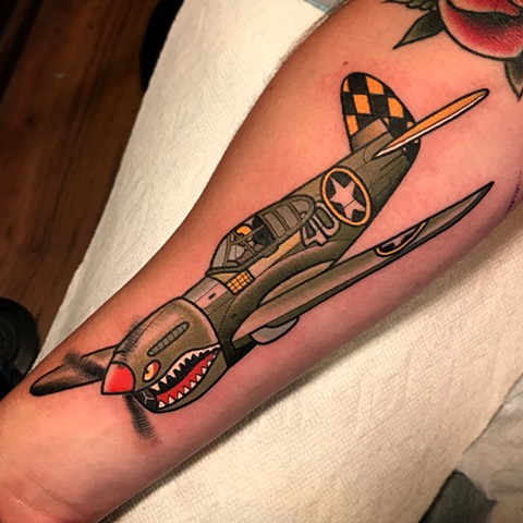 fighter plane tattoo by dave wah at stay humble tattoo company in baltimore maryland the best tattoo shop and artist in baltimore maryland