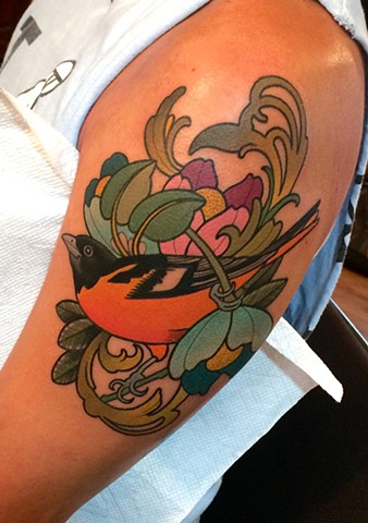 oriole bird tattoo by dave wah at stay humble tattoo company in baltimore maryland the best tattoo shop in baltimore maryland