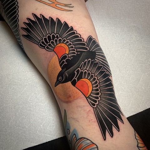 red winged blackbird tattoo by tattoo artist dave wah at stay humble tattoo company in baltimore maryland the best tattoo shop in baltimore maryland
