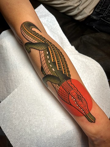 alligator tattoo by tattoo artist dave wah at stay humble tattoo company in baltimore maryland the best tattoo shop in baltimore maryland